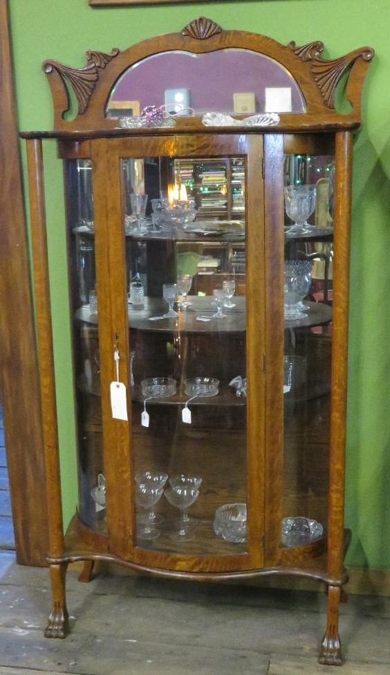 Curved glass curio cabinet